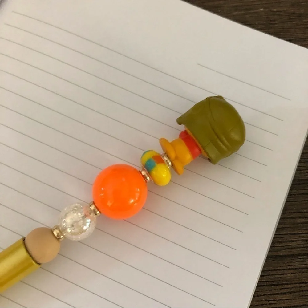 Disney doorables: Winnie the Pooh handmade beaded pen